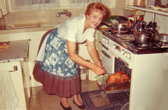 014 - Your Great grandma Weaver, basting our Thanksgiving turkey.  This is probably the late 1950s.
